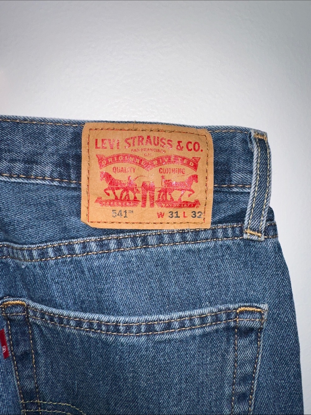 Levi's Blue Straight Leg Jeans with Tan Leather Patch